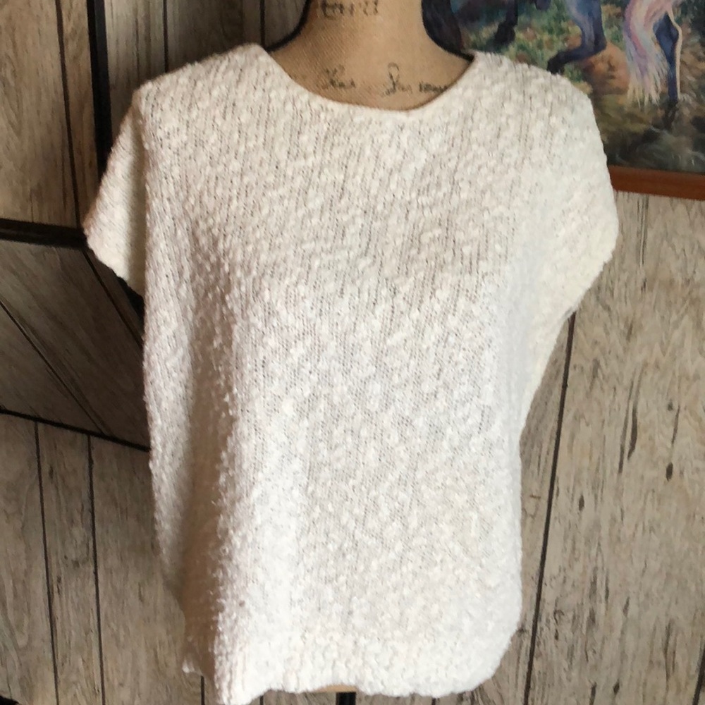 Women’s white sleeveless sweater